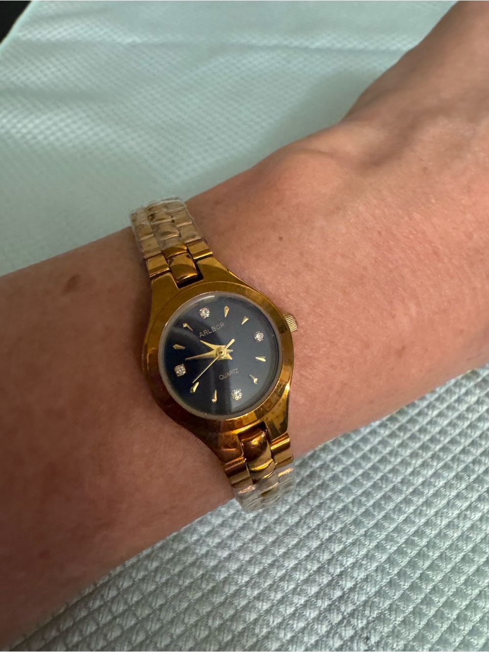 Gold Tone Women's Watch with Black Dial and 4 Diamond Markers  - ARLBOR